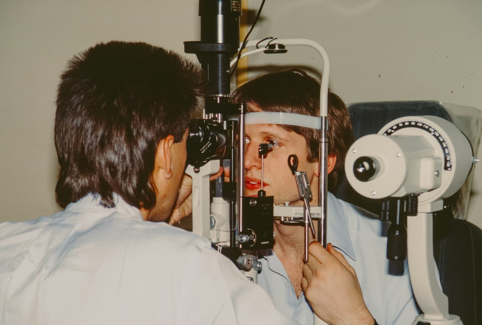 Eye specialist examining a patient